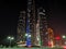Beautiful view of Abu Dhabi towers and streets at night - Etihad Towers