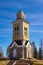 beautiful view of ancient Lutheran Church whith bell tower in kerimaki of southern Savo province on a sunny spring day. The