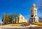 beautiful view of ancient Lutheran Church whith bell tower in kerimaki of southern Savo province on a sunny spring day. The