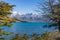Beautiful view of aqua blue Laguna Azul with nature three tower mountains peak in clear blue sky in autumn, Torres del Paine