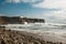 Beautiful view of the Atlantic Ocean and in the distance the fortress of Sagres in Portugal