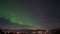 Beautiful view of the aurora, bright polar lights in the night sky.