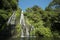 Beautiful view of Banyumala Waterfall in Indonesia against the blue sky