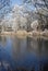 Beautiful view of Bavarian frozed lake and shore among trees