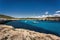 Beautiful view of the bay with turquoise water and yachts in Cala Mondrago National Park on Mallorca island