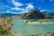 Beautiful view of bend in Katun river with blue bky and clouds in the Altai mountains. Amazing landscape of the river and high