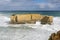Beautiful view of the big rock called The Bakers Oven on a windy sunny day, Great Ocean Road, Australia
