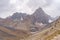 The beautiful view of blue sky and snow mountain summit near to Zmeya peak in Fann mountains in Tajikistan