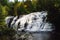 Beautiful view of Bond Falls against the background of lush trees. Michigan, United States.