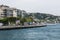 Beautiful View of Bosphorus Coastline in Istanbul with Exquisite wooden Houses and Boat