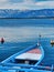 Beautiful view from a bow of yacht at seaward. An adventurous person doing windsurfing with a lot of speed  on a lake in the