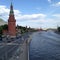 Beautiful view from the bridge to the Kremlin, river and busy street