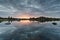 Beautiful view of a calm lake at scenic sunrise in Los Barruecos, Caceres, Extremadura, Spain