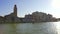 Beautiful view on canal in Venice from the boat, sun reflections on water