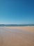 beautiful view of the Cantabrian Sea on a day of calm waters on a beach in spring Cantabria