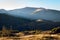 Beautiful view of the Carpathian Mountains in the sunlight. Hiking season. Mountain trips. Copy space