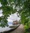 Beautiful view of Chateau de Chillon at Lake Geneva, one of Switzerland`s most visited castles in Europe, with sky full of cloud