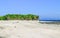 Beautiful view of the Chera Dwip, Bangladesh. The crystal clear seawater, the rocks, and the sun group up to create scenery.