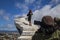 Beautiful view of the city of Dalat, Vietnamese tourists take pictures on the stairs, above the city