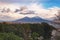 Beautiful view of the city of Napoli Naples and mountain Vesuvius in the background at cloudy winter day. Campania, Italy