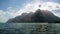 Beautiful view of crepuscular rays over the mountains. Riva Del Garda, Italy