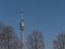 Beautiful view of Donauturm (Danube Tower) in the north of Vienna, Austria on sunny day with blue sky.