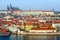 Beautiful view of embankment of Vltava River, historic district Mala Strana, Prague Castle, Prague, Czech Republic