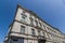 Beautiful view Facade of baroque house. Classic architecture building facade of beige stone with white wooden windows