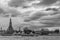 Beautiful view of the famous Buddhist Temple of Dawn, Wat Arun, on the Chao Phraya River, against a dramatic sky Bangkok, Thailand