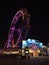 Beautiful view of famous ferris wheel Wiener Risenrad in amusement park Wurstelprater in Vienna, Austria by night.