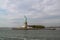 Beautiful view of famous Statue of Liberty and Manhattan on background. Liberty Island in New York Harbor in New York