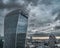 Beautiful view of the Fenchurch Building (The Walkie-Talkie) in with gray cloudy sky