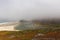 Beautiful view of a foggy coastline in Big Sur, California