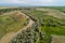 A beautiful view of the forest, fields and river from above. Drone photography of the city