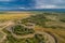 A beautiful view of the forest, fields and river from above. Drone photography of the city