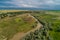 A beautiful view of the forest, fields and river from above. Drone photography of the city