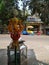 Beautiful view of Goddess Face in the Yellow Color Trishula or Trident in front of the Sri Gangamma Devi Temple Near Kadu