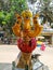 Beautiful view of Goddess Face in the Yellow Color Trishula or Trident in front of the Sri Gangamma Devi Temple Near Kadu