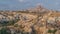 Beautiful view of Goreme from viewpoint aerial timelapse, Cappadocia, Turkey during sunrise.