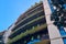 Beautiful view of the green balconies of the building. Warm climate.