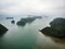 Beautiful view of Halong Bay from the height. Top view of the rocks sticking out of their water. northern vietnam
