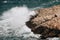 Beautiful view of huge rocks and wavy, active sea in Marseille, France