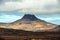 Beautiful view of the iconic mountain Stac Pollaidh on the shore of Loch Lurgainn in the Highlands of Scotland