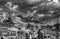 Beautiful view of the inhabited center of the hill town of Taormina, Messina, Sicily, Italy, against a dramatic sky