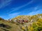 Beautiful view of the isolated mountain village houses with traditional architecture rooftops surrounded by natural environment,