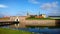 Beautiful view of the Kronborg castle - view of the entrance gate, the channel in the day time