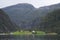 Beautiful view of the lake with green mountains. Naeroyfjord, Norway.