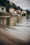 Beautiful view on lake and old buildings in Stresa city, Italy. Architecture and shore on Lago Maggiore in sunny day on background