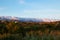 Beautiful view of a large cloud rolling over the mountains