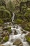 Beautiful view of Leshnishki Waterfall in deep forest, Belasitsa Mountain